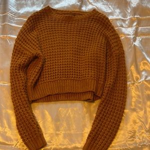 Knitted burnt orange sweater